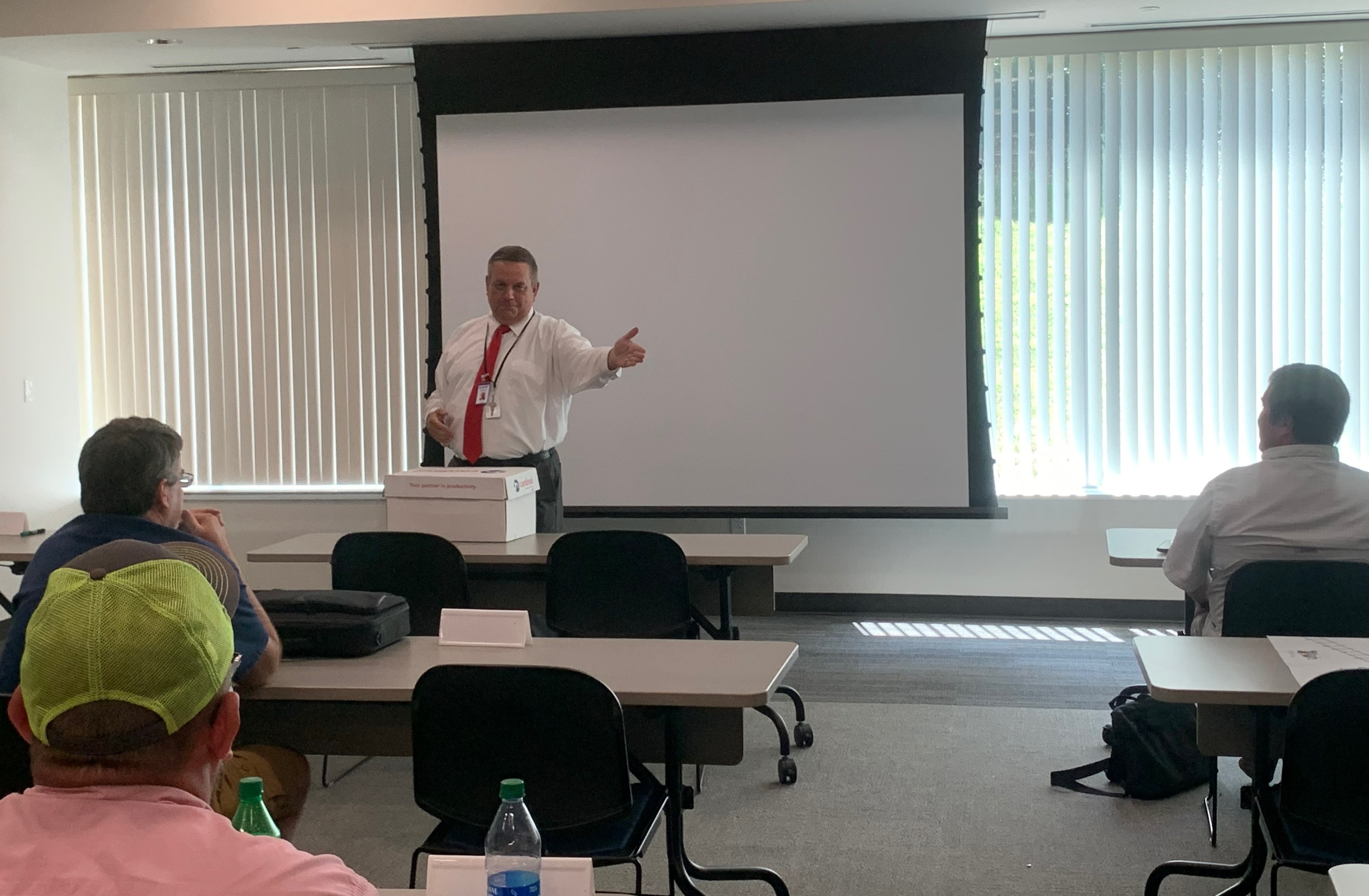 Photo of Joe Shepherd teaching a Driver Trainer Instructor class.