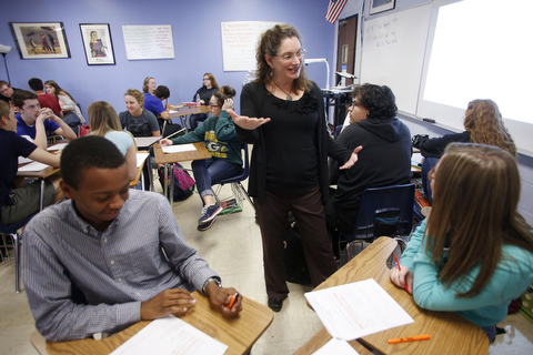 female teacher with students